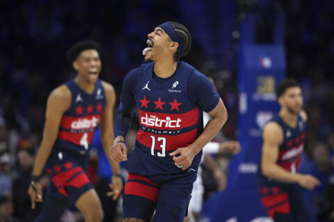 Wizards use a big opening quarter to never trail in 119-114 victory over 76ers
