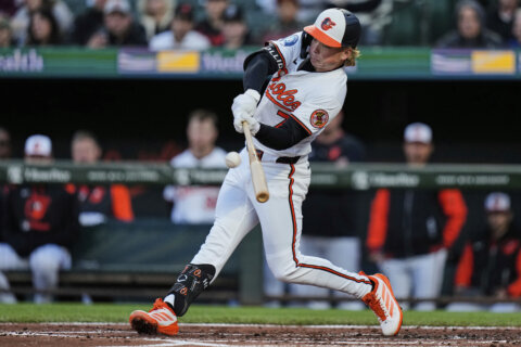 A grand slam for Coconut — Jackson Holliday hits one with his dog in attendance