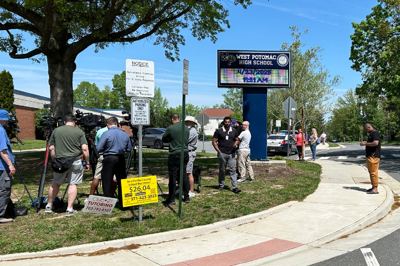 <p>Parents and reporters gathered outside of West Potomac High School after a stabbing on April 23, 2025.</p>