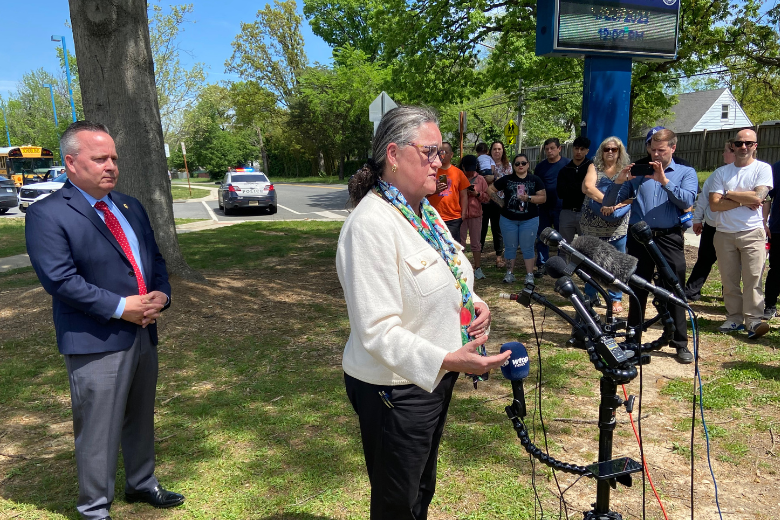 <p>Superintendant Michelle Reid answers questions outside of West Potomac High School after a student was stabbed nearby classrooms.</p>